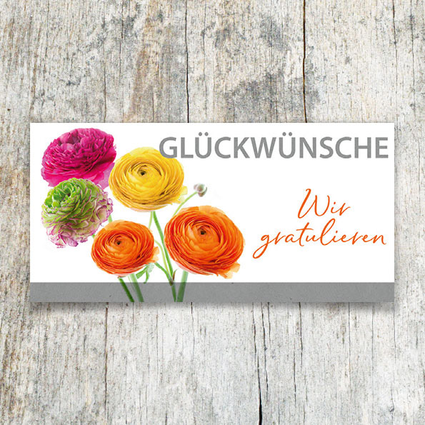 Vergrößerte Abbildung Glückwunschkarten DIN lang mit bunten Ranunkelblüten in Blindprägung und den Schriftzügen Wir gratulieren – Glückwünsche auf weißem Karton