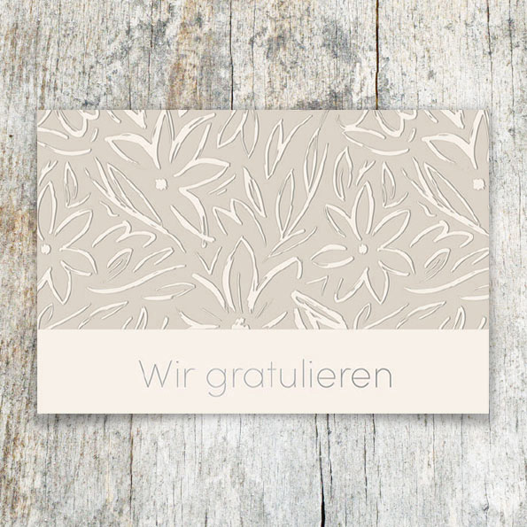 Vergrößerte Abbildung Glückwunschkarte mit Blindprägung von Blumen und Silberfolienprägung