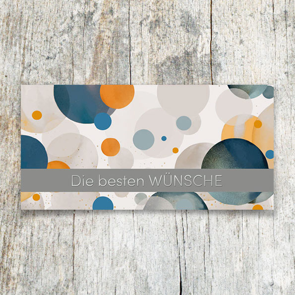 Vergrößerte Abbildung Glückwunschkarte DIN lang mit bunten Kreisen, grauem Balken und silbergeprägtem Schriftzug Die besten Wünsche auf weißem Karton